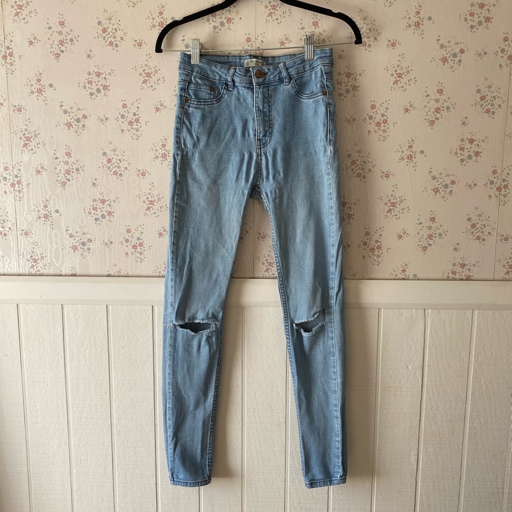 High waisted ripped skinny jeans